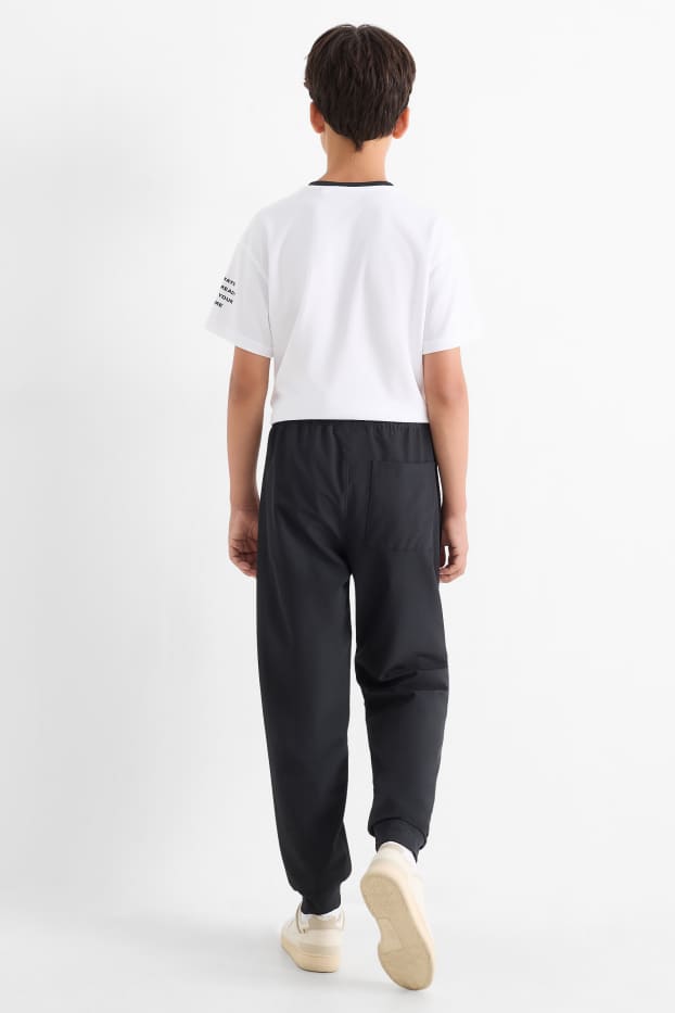 Copii - Băieți - Pantaloni de trening - negru