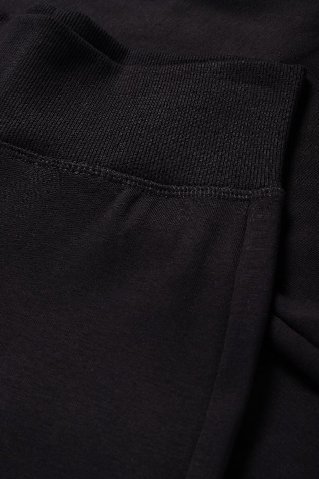 Dámské - Flared legíny - černá