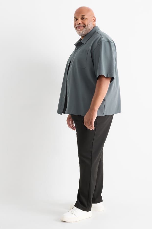 Bărbați - Chino - tapered fit - negru