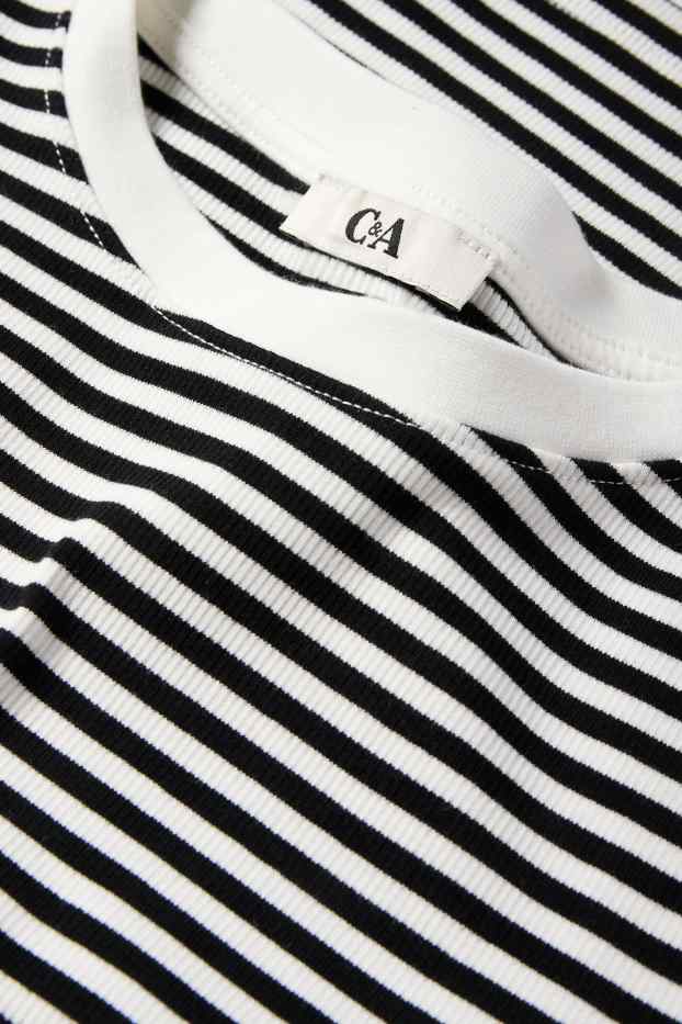Dames - Korte longsleeve - geribd - met strepen - zwart / wit