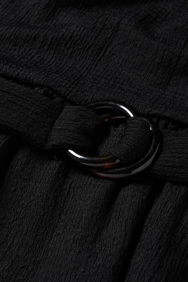 Dámské - Šaty fit & flare s páskem - strukturované - černá