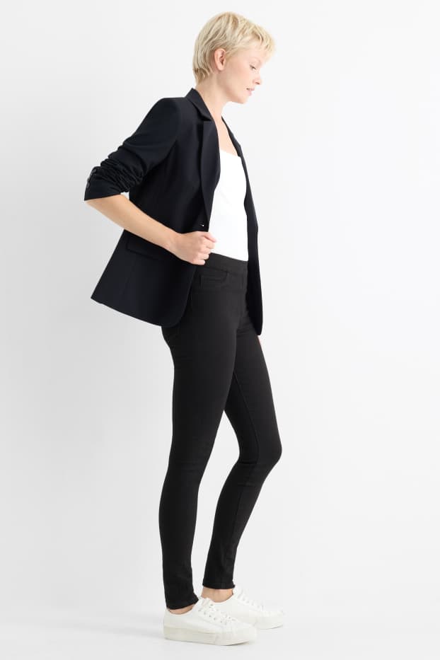 Femei - Jegging jeans - talie medie - negru