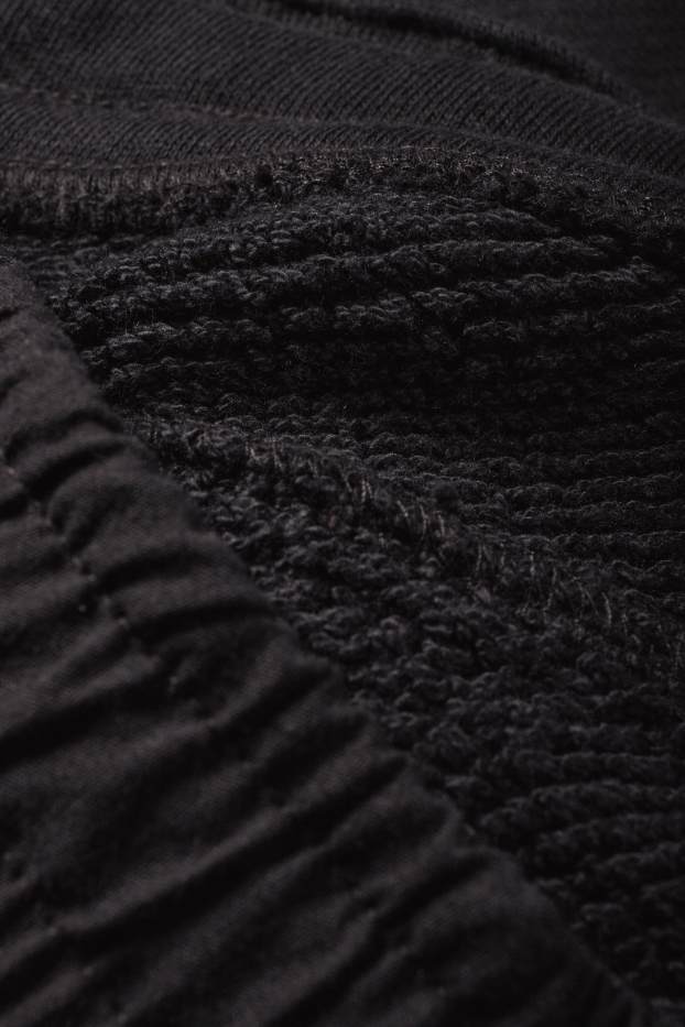 Bărbați - Pantaloni de trening - negru
