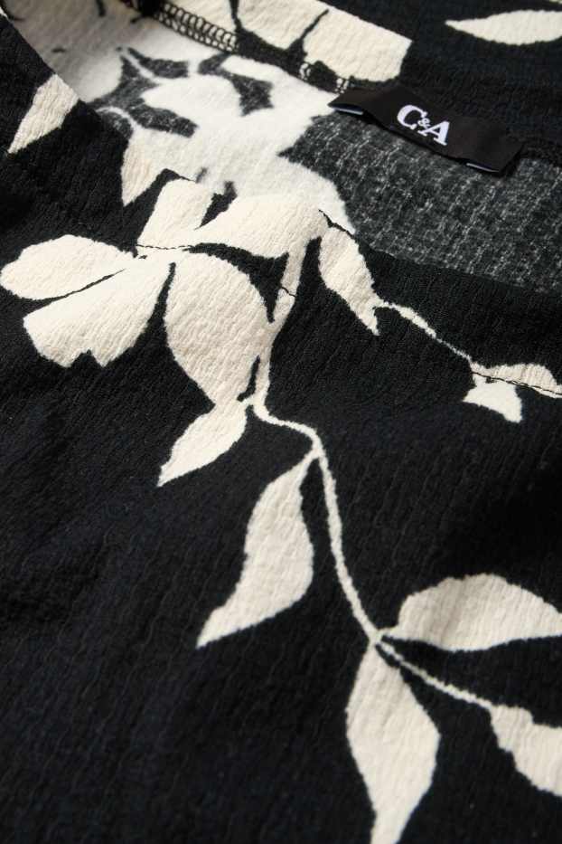 Femei - Tricou cu mânecă lungă - regular fit - cu flori - structurat - negru / alb