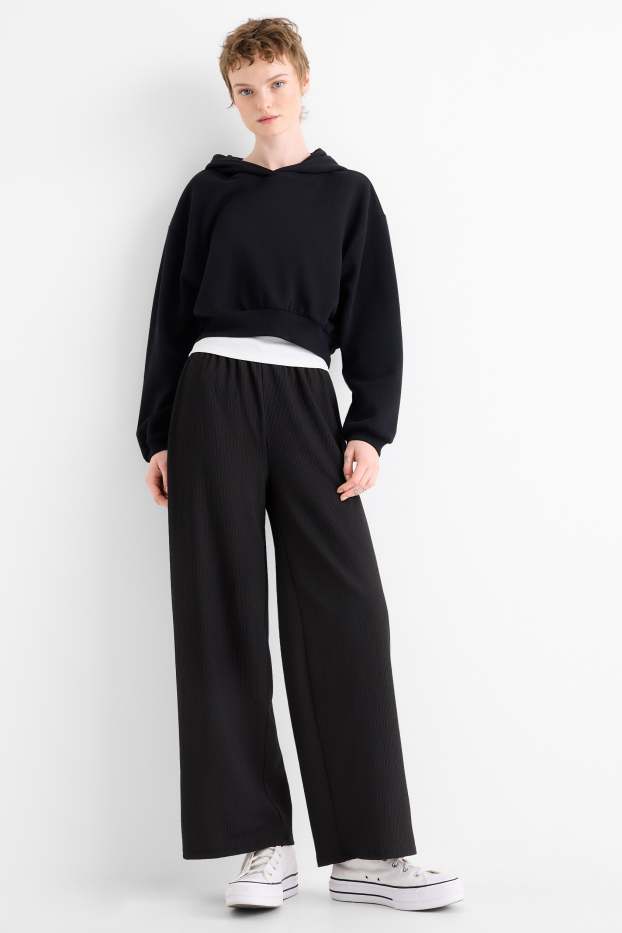 Women - Jersey trousers - mid-rise waist - wide leg - textured - black
