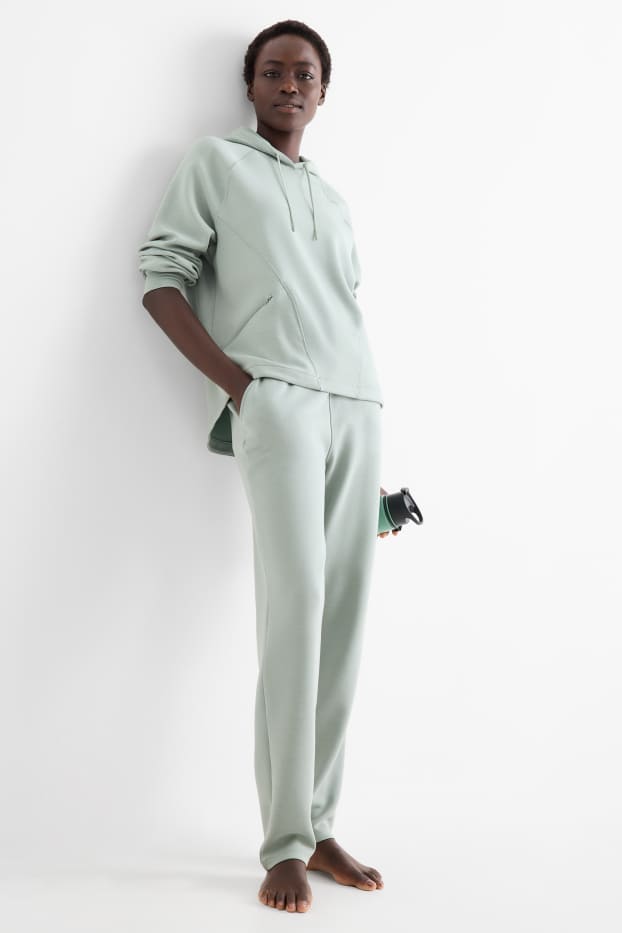 Femei - Pantaloni funcționali - verde deschis