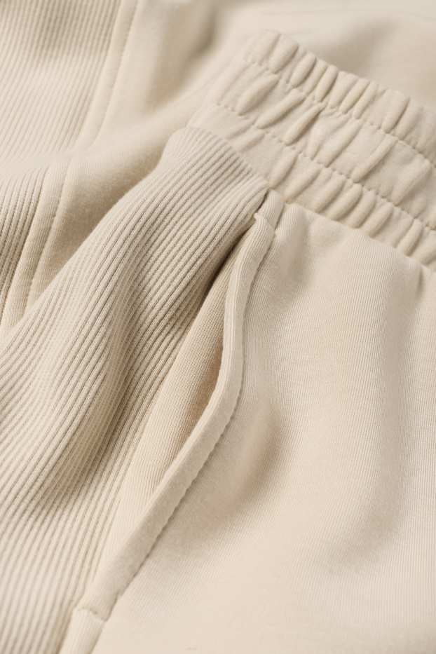 Femei - Pantaloni de sport - bej deschis