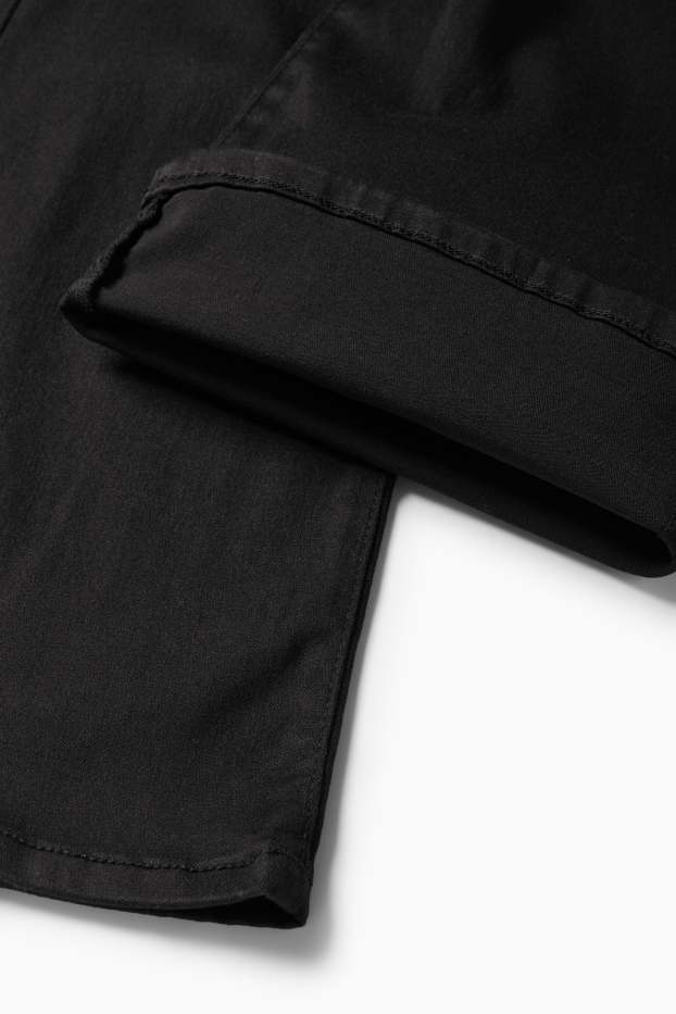 Femei - Pantaloni de stofă - talie înaltă - evazați - negru