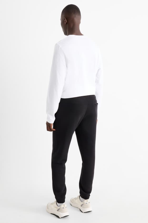 Bărbați - Pantaloni de trening - negru