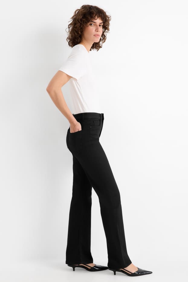 Femei - Pantaloni de stofă - talie înaltă - evazați - negru