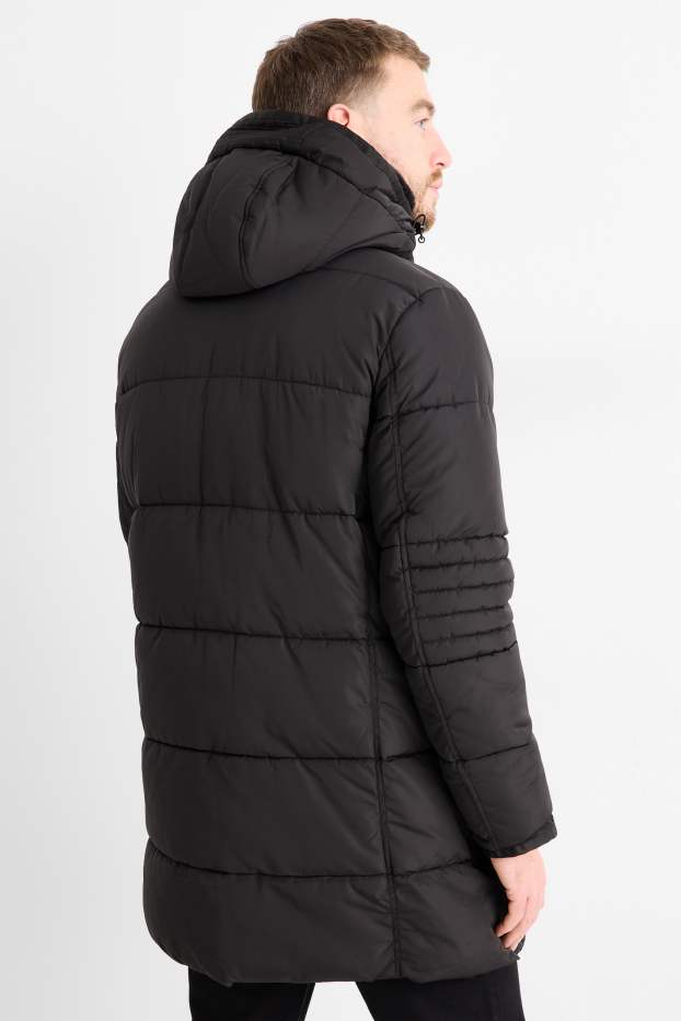 Bărbați - Parka matlasată cu glugă și aplicații din blană artificială - rezistentă la apă - negru