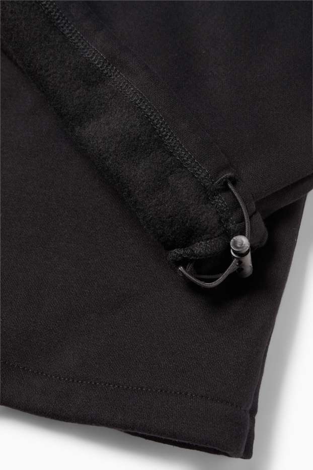 Bărbați - Pantaloni de trening - negru