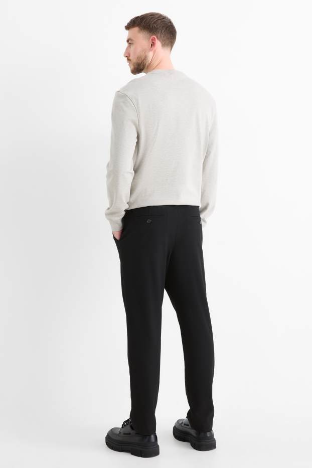 Bărbați - Chino - tapered fit - negru